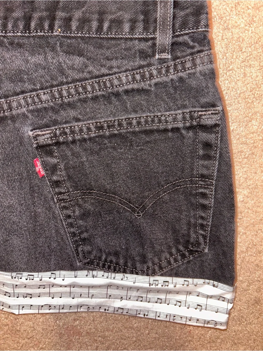 Upcycled size Men’s 34 Levi’s black denim miniskirt